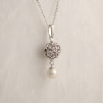 Scrolled Globe & Pearl Pendant